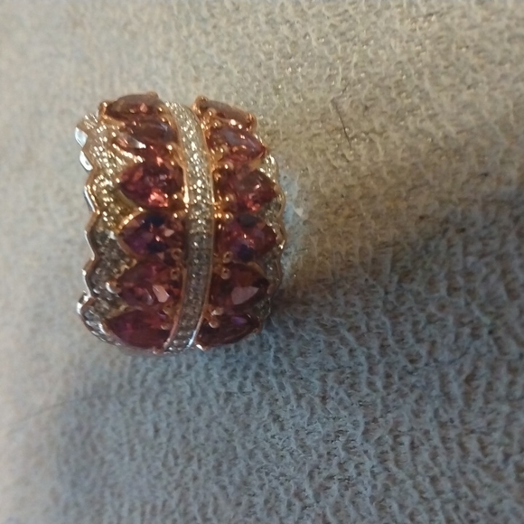 Stamped .925 Orissa Rhodolite Garnetand Diamond Ring8.2...